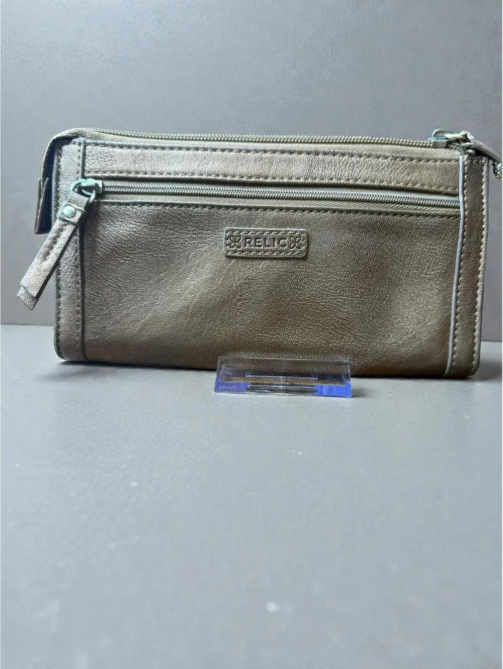 Relic Bronze Metallic Leather Wristlet with Floral Applique